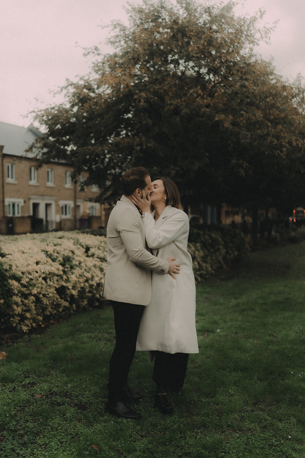 Romantic embrace of Victoria and George captured by Paulina Tran Photography