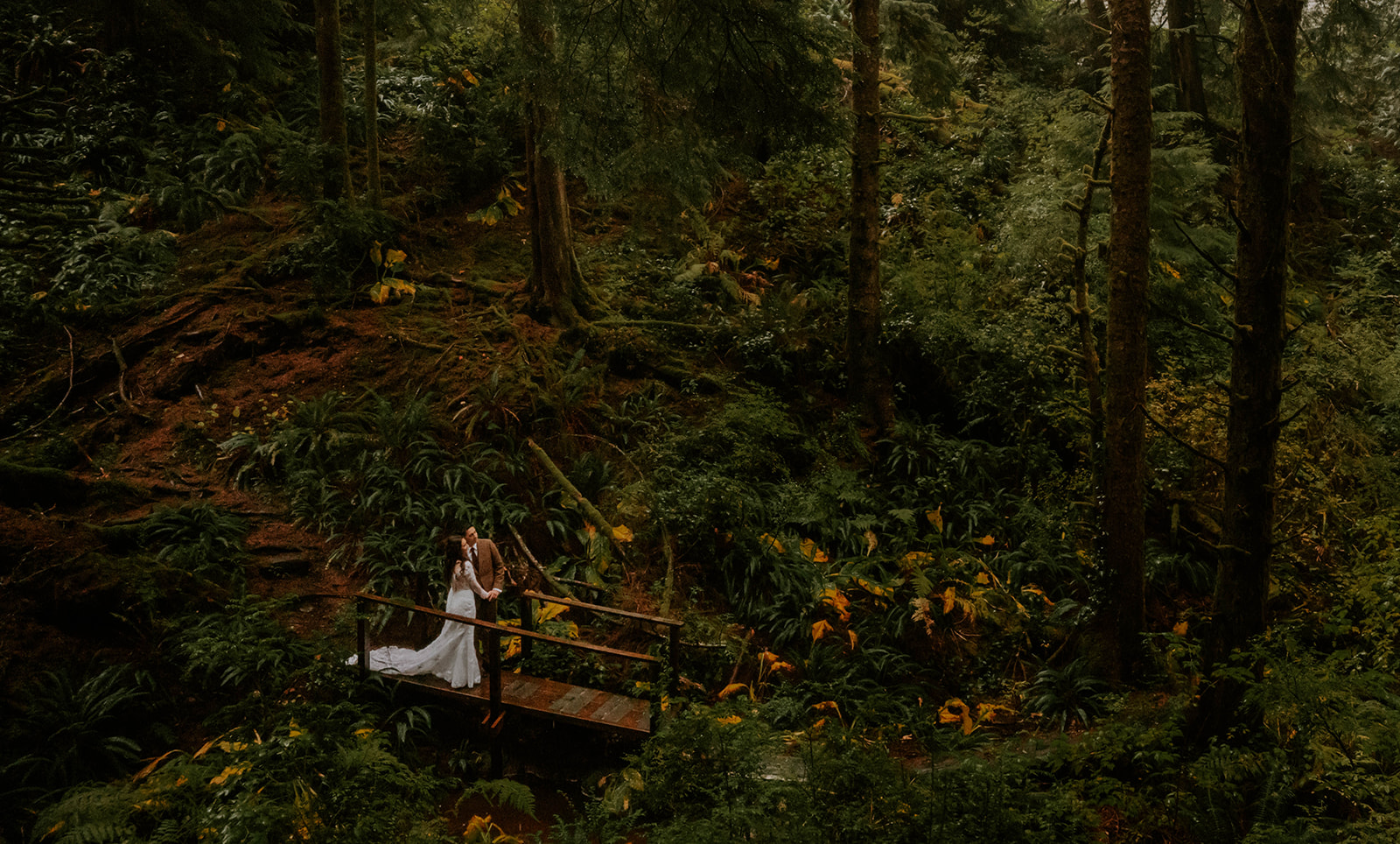 Bride and groom on the nature trail at Salishan Coastal Lodge in Gleneden.