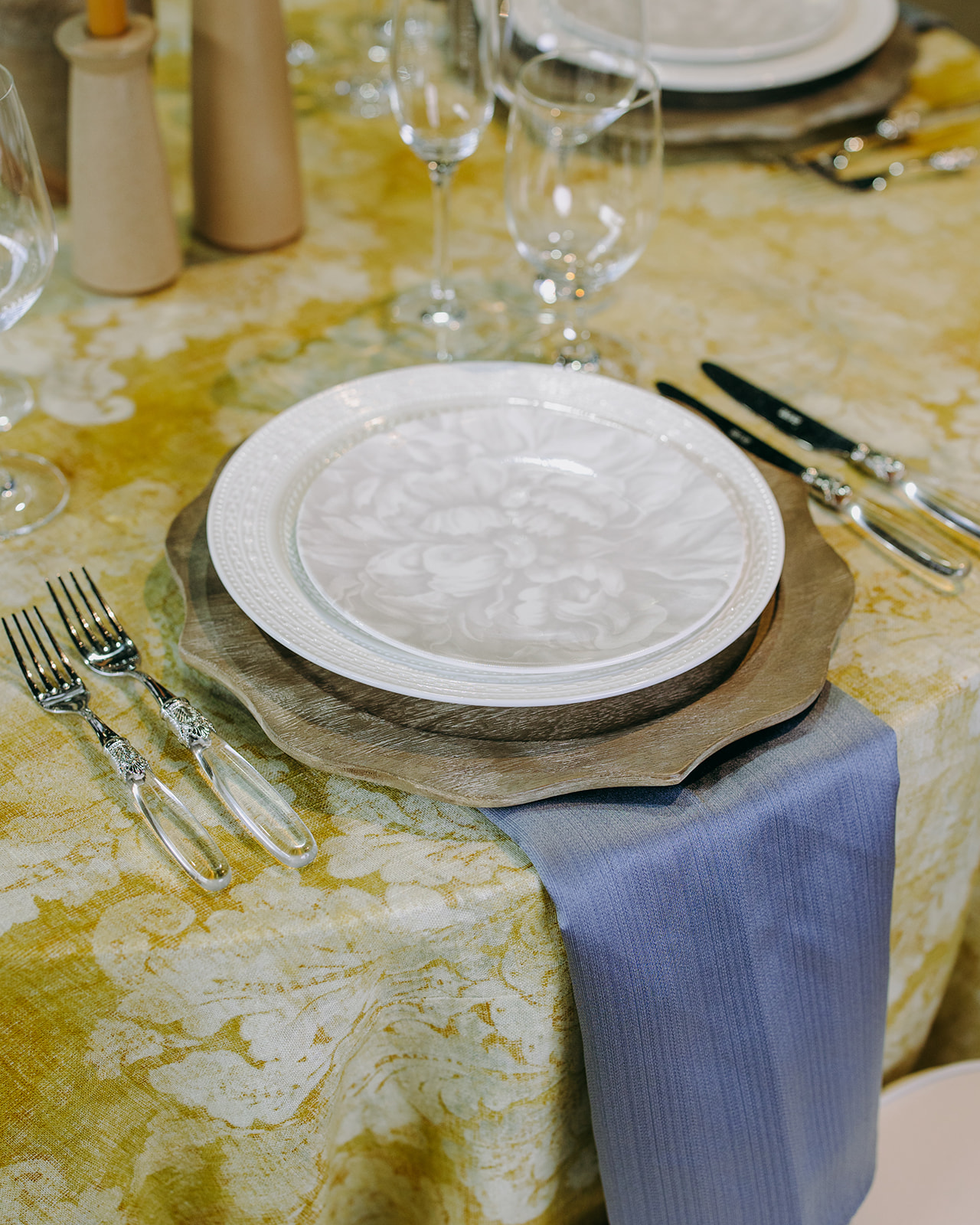 a white plate on a yellow table 