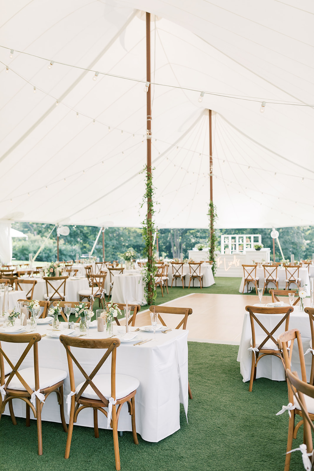 reception tent details with table setup at smith farm gardens