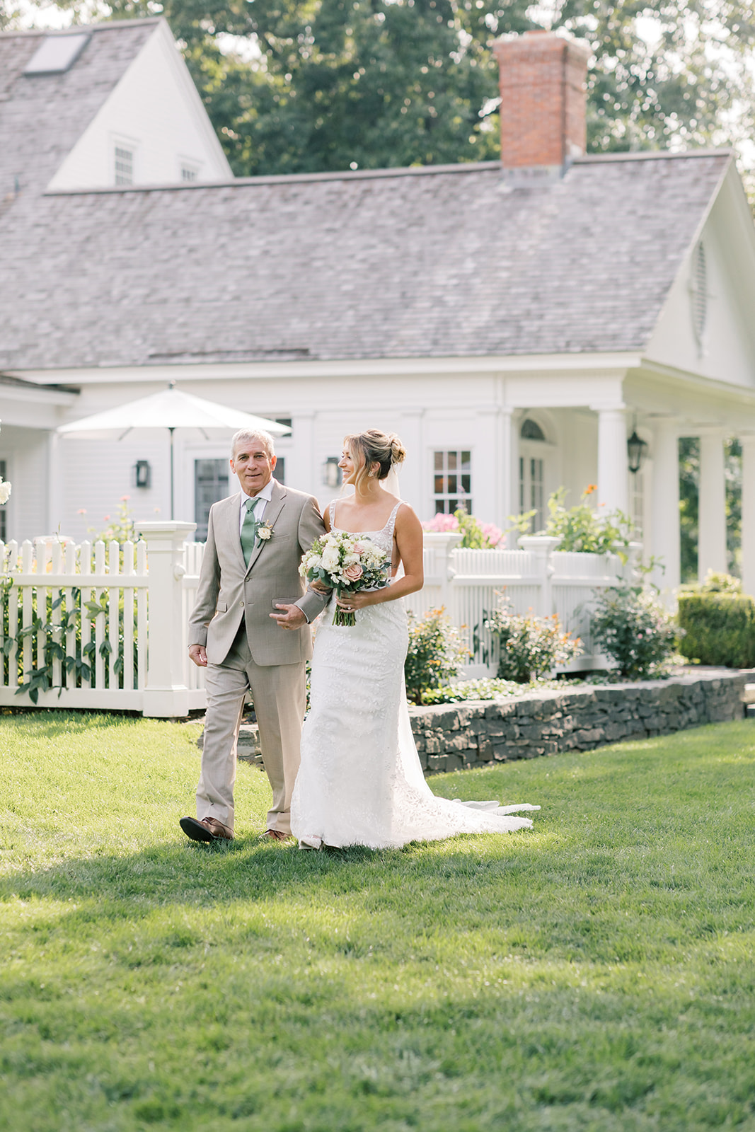 bride and father walking down the aisle at smith farm gardens summer wedding