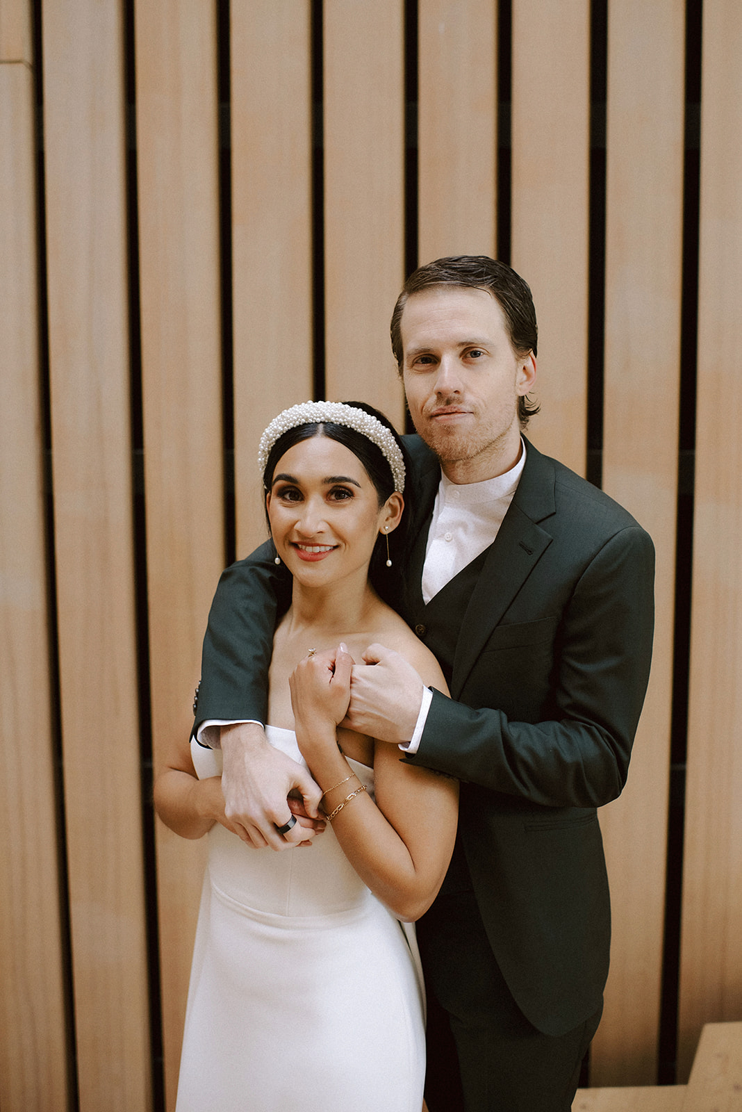 Vancouver, BC Wedding Photographer captures wedding portraits of couple at Audain museum in Whistler