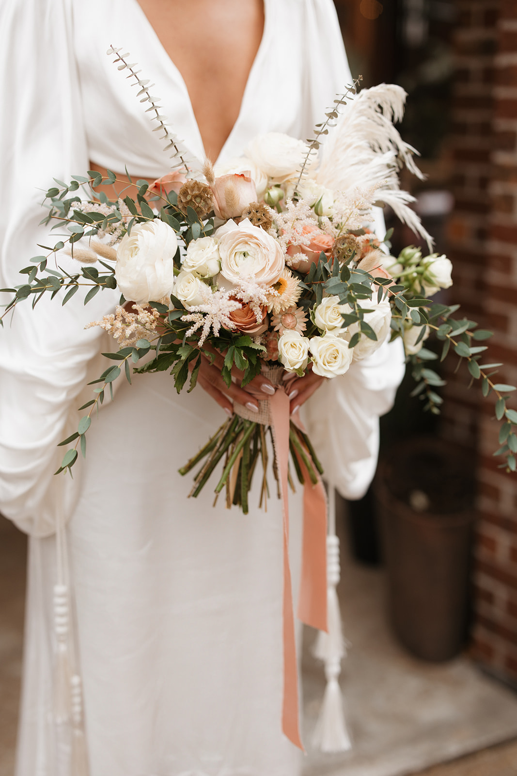 Bride holding flowers at Verde on Cherokee