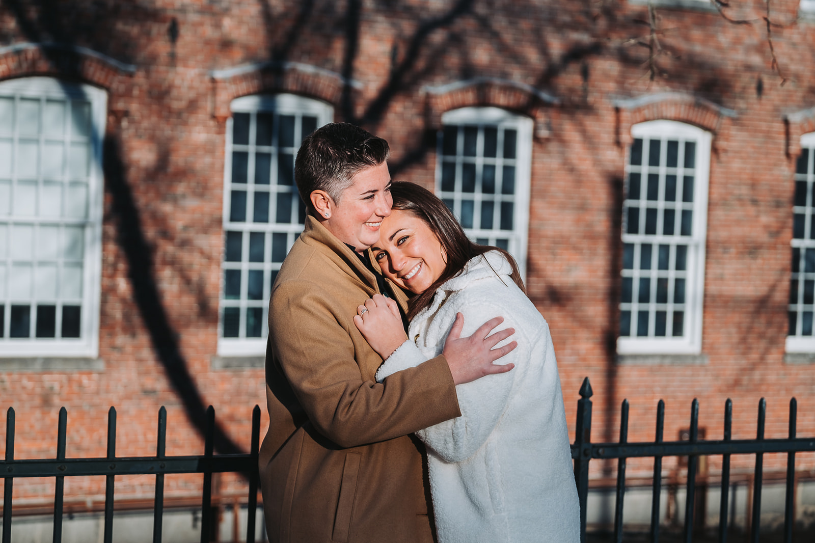 same sex couple intimate and fun engagements fall session at the historic Boott Cotton Mills Museum 