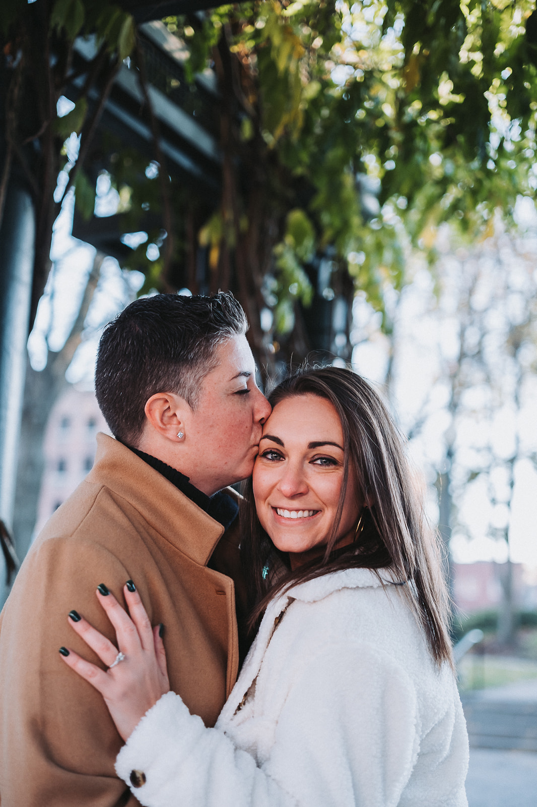 same sex couple intimate and fun engagements fall sunset session at the historic Boott Cotton Mills Museum 
