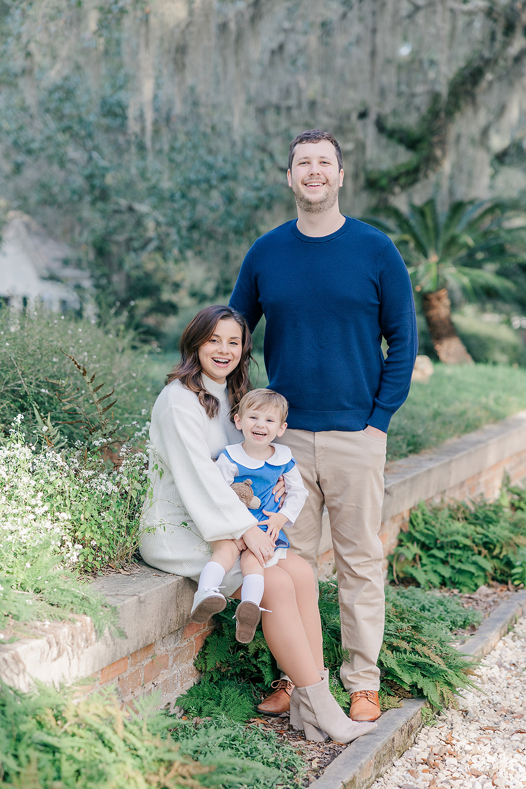 Family photos with toddler boy in classic blue and white colors at Goodwood Museum