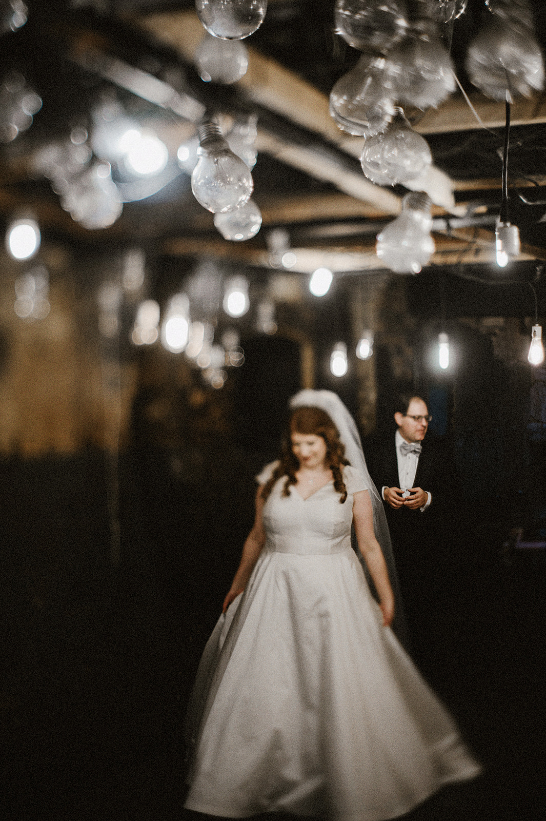 creative bride and groom portrait in the engine room of the industrial venue of the art factory in paterson nj