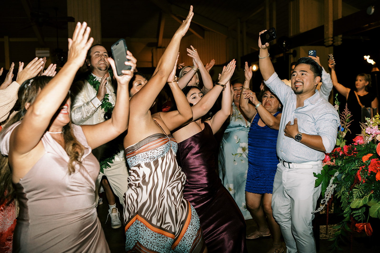 Guests dancing and celebrating at Hawaiian Wedding reception in Smiths Tropical Paradise Kauai