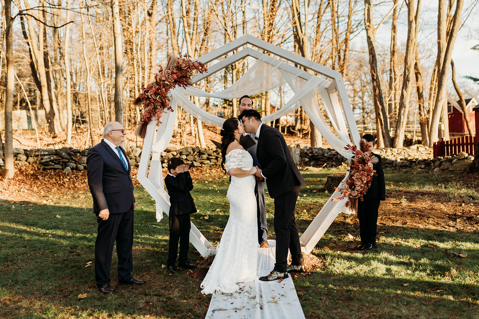 Emotional embrace between the bride and groom, surrounded by the beauty of their Connecticut wedding day