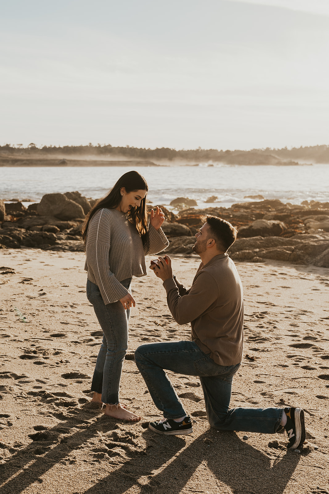 Proposal on the beach during golden hour in Carmel-by-the-Sea