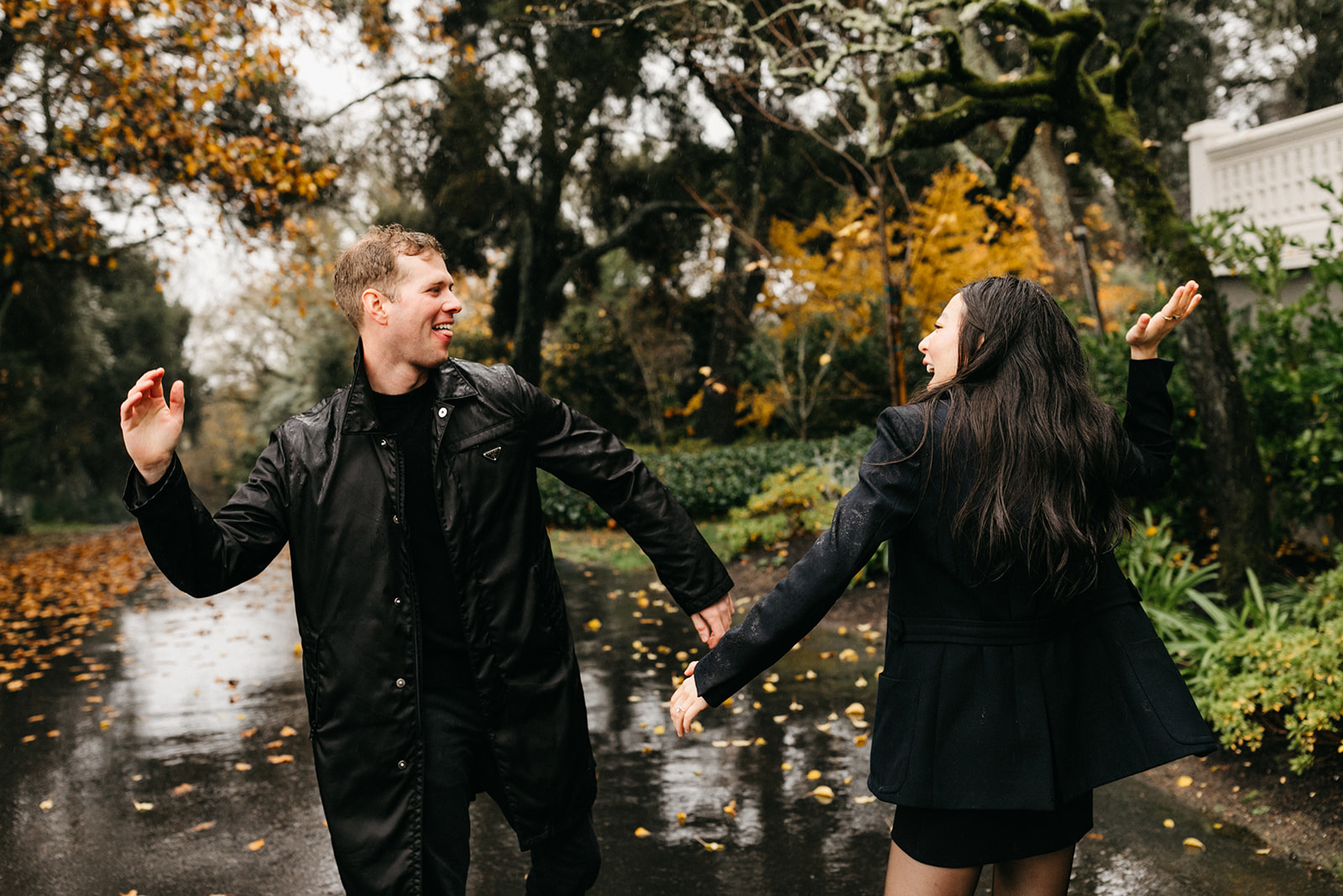 couple high-fiving during engagement session