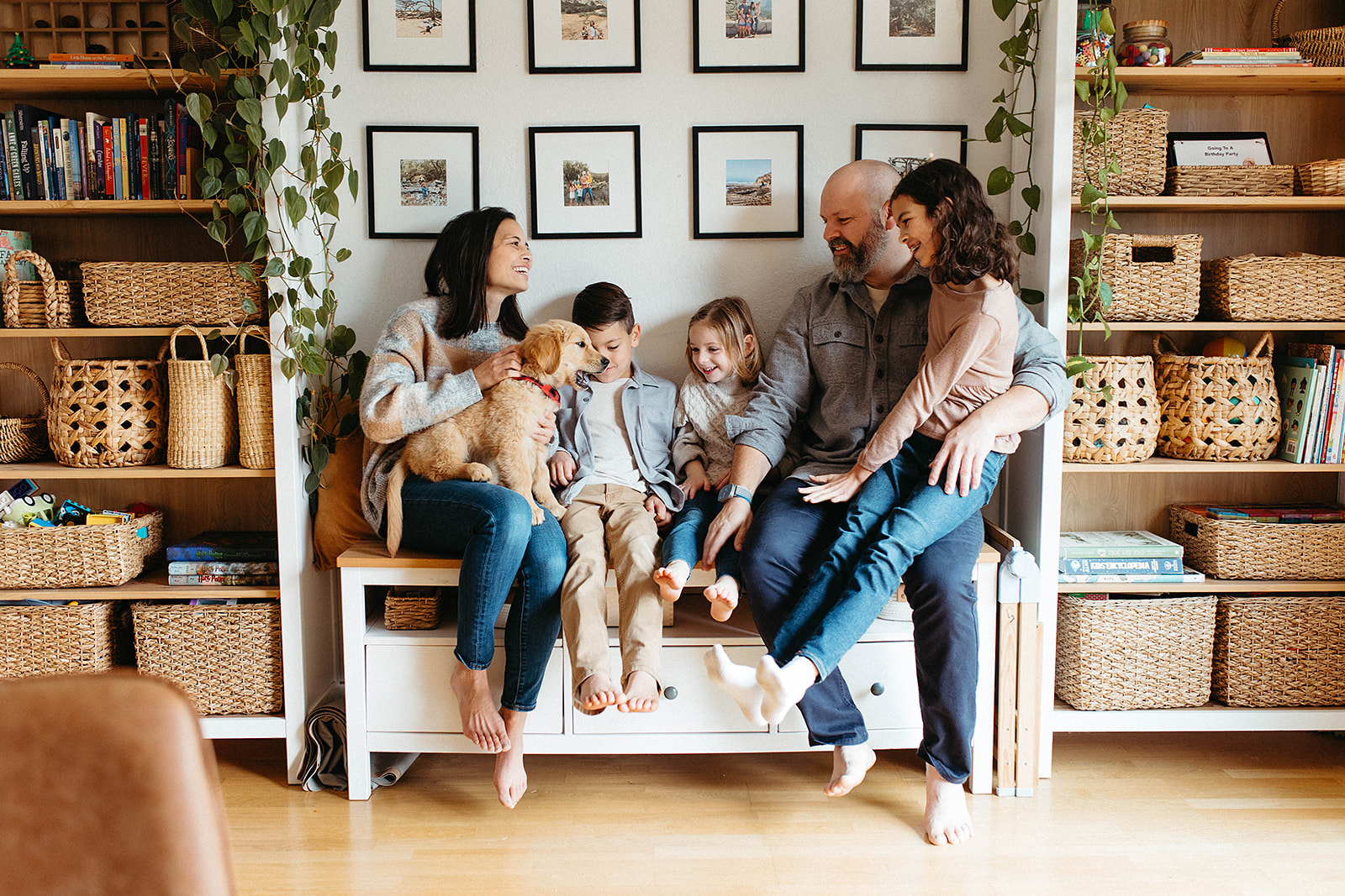 a family home session in a sunfilled livingroom 