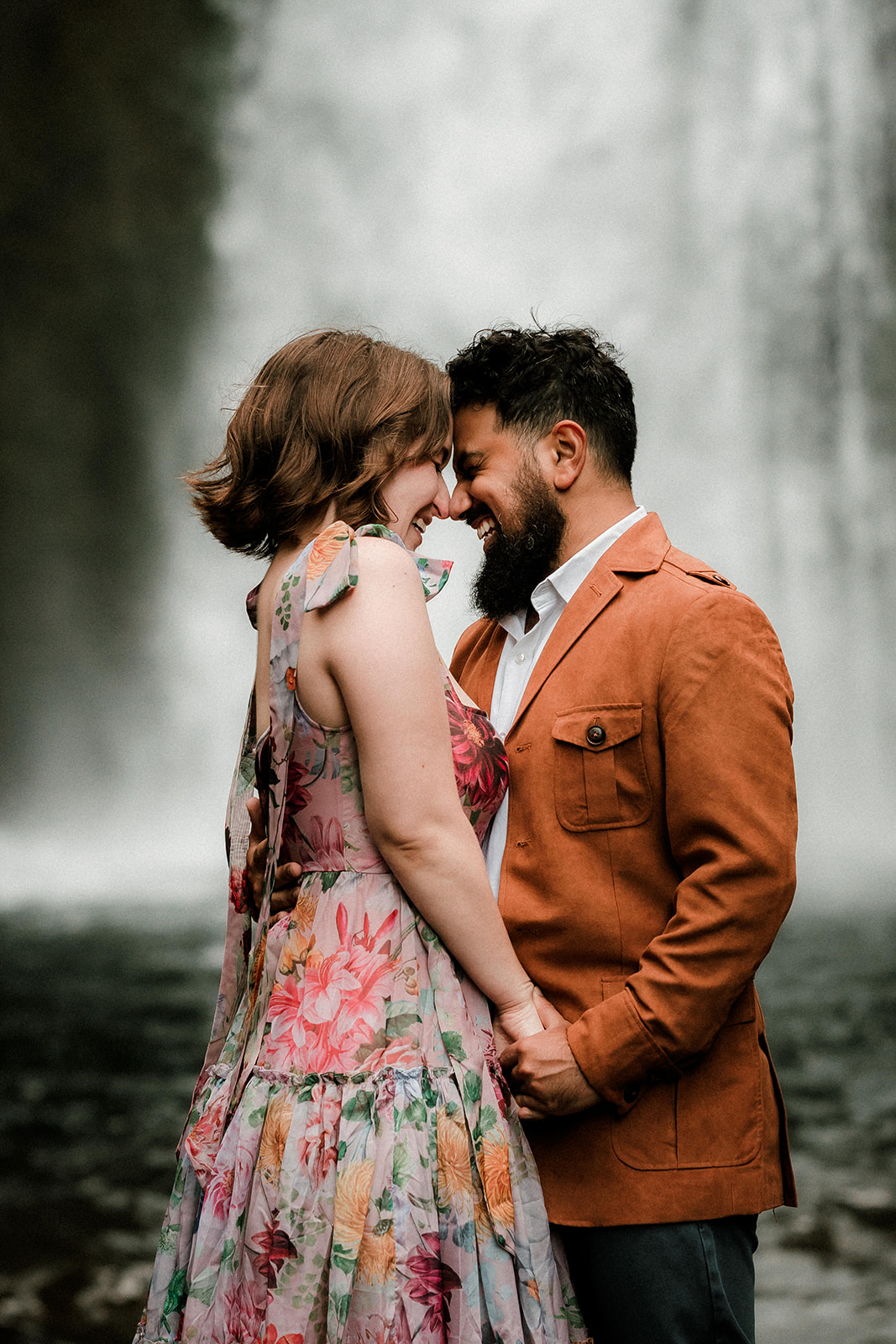 Fun romantic and moody engagement photographs of couple at Wahclella Falls in Portland Oregon
