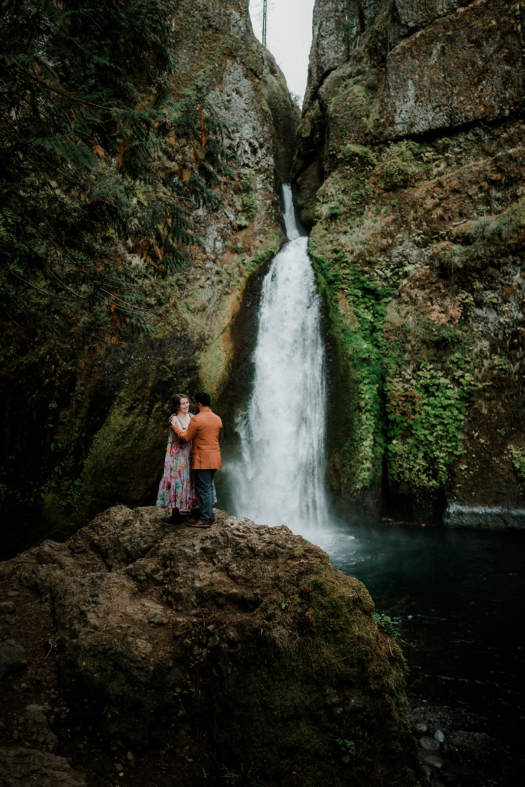 romantic bride and groom at Wahclella Falls engagement session