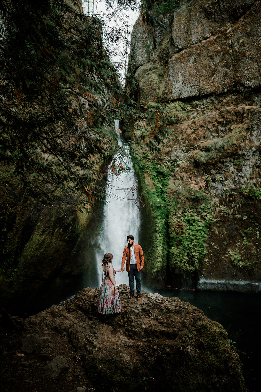 romantic bride and groom at Wahclella Falls engagement session
