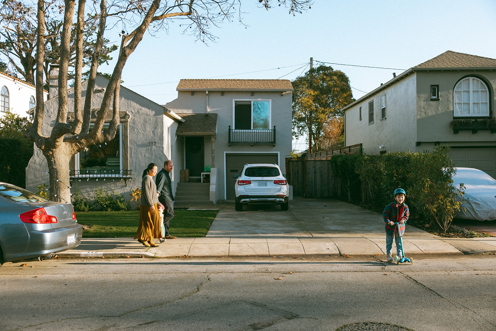 family walking around their neighborhood