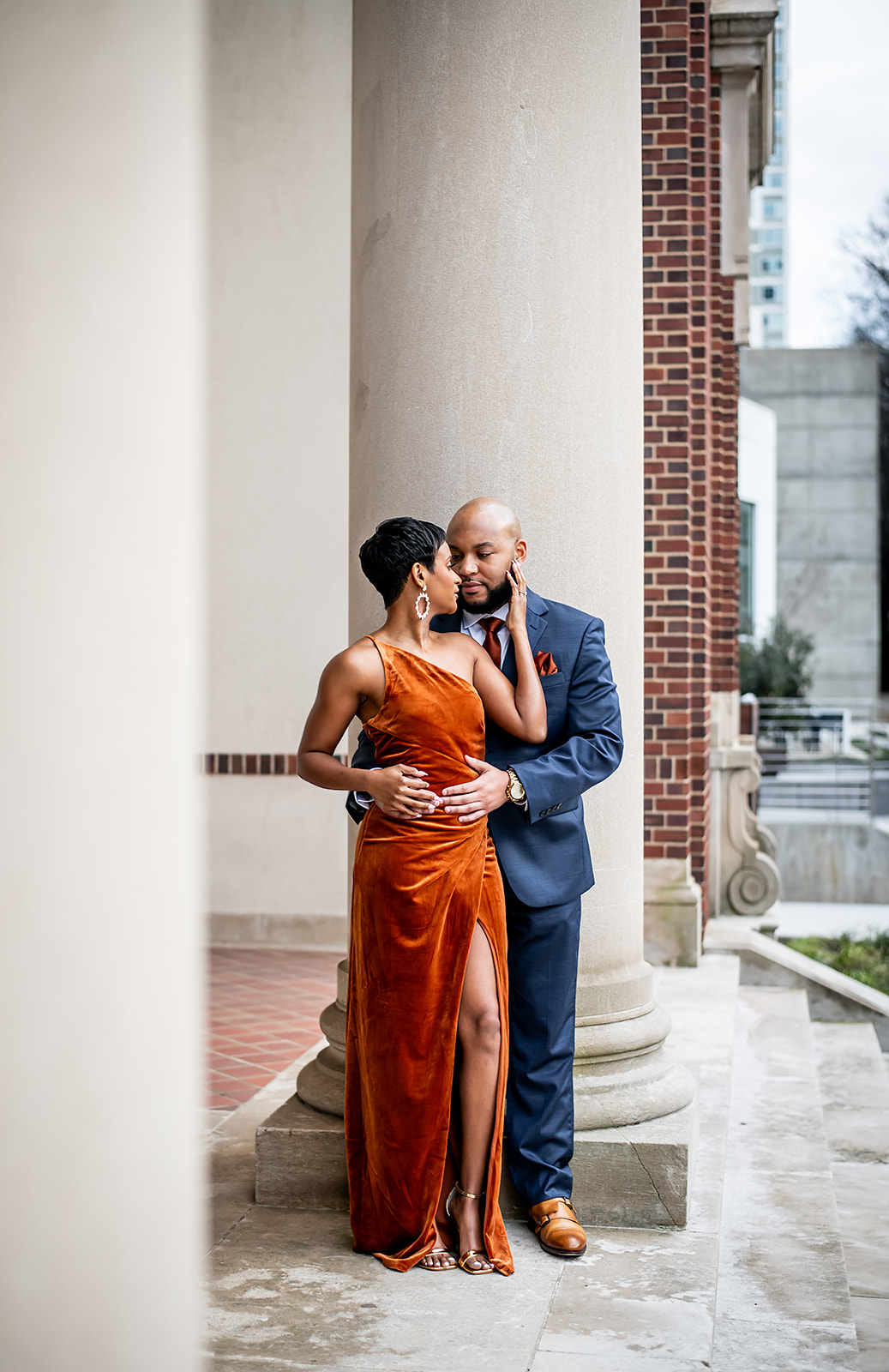 Black Couples portraits on historic building steps in downtown atlanta with JGraced Photography black weddings