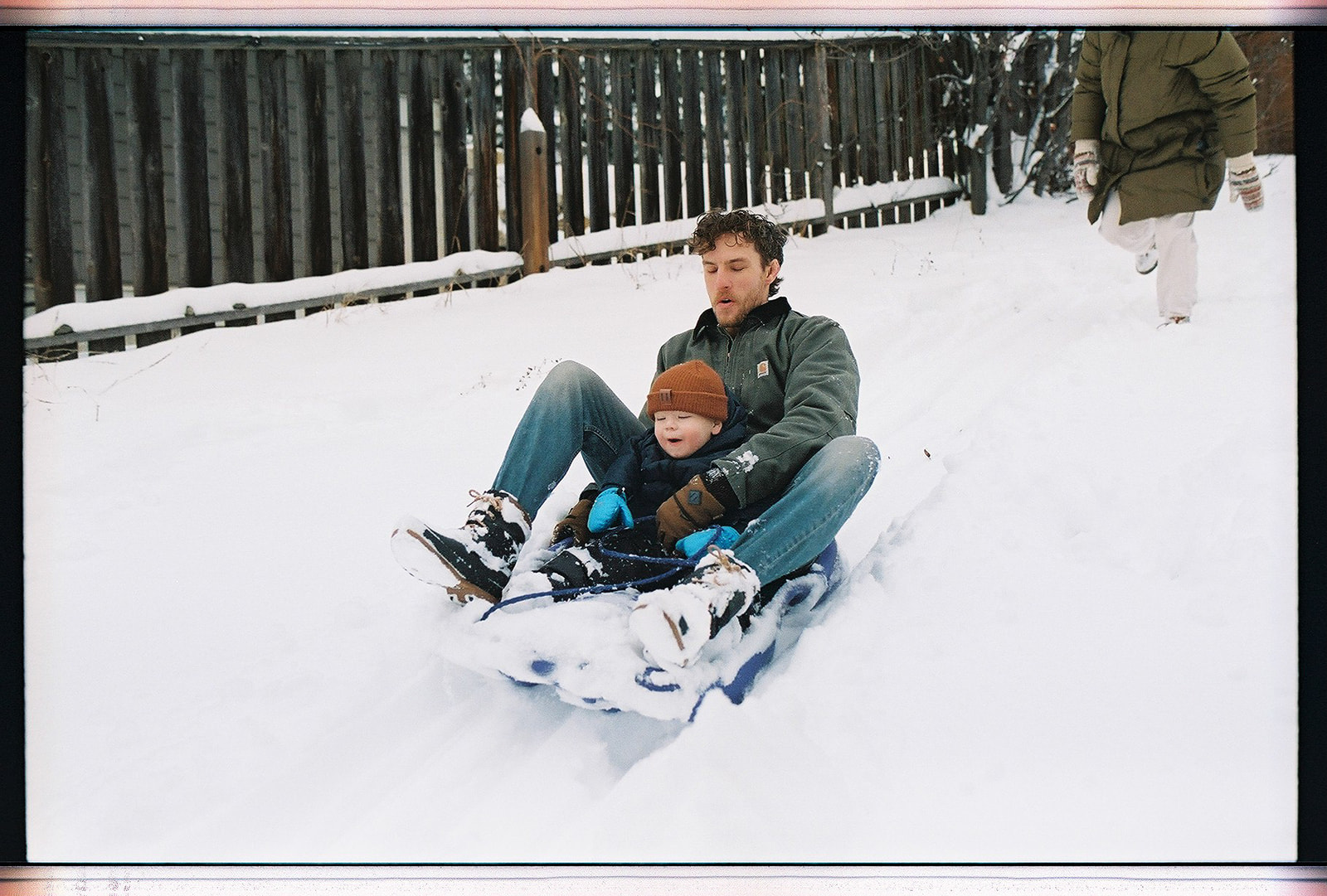 kelowna family film and documentary family photography at home, 35mm film, playing in the snow