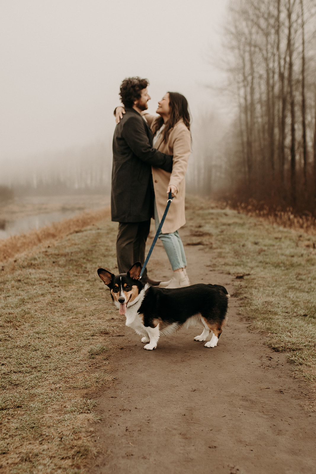 A couple having their engagement photos photographed by Pitt Lake in Pitt Meadows, BC