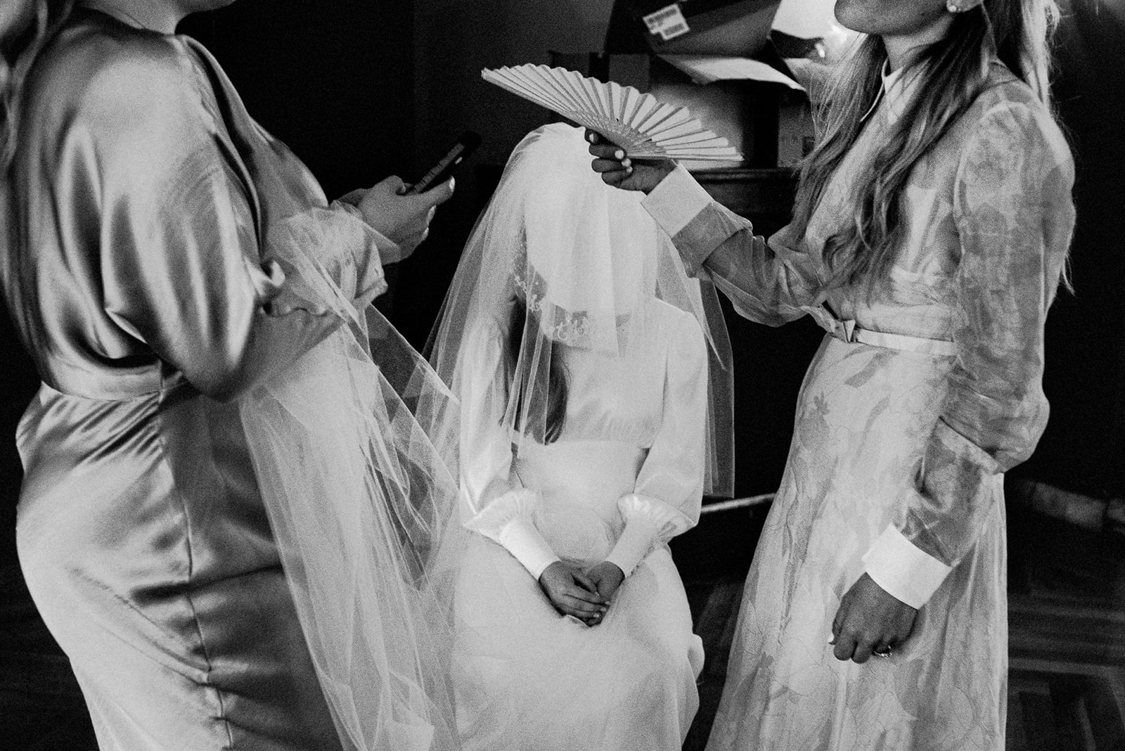 bride waits, covered by veil, moments before her orthodox jewish wedding ceremony