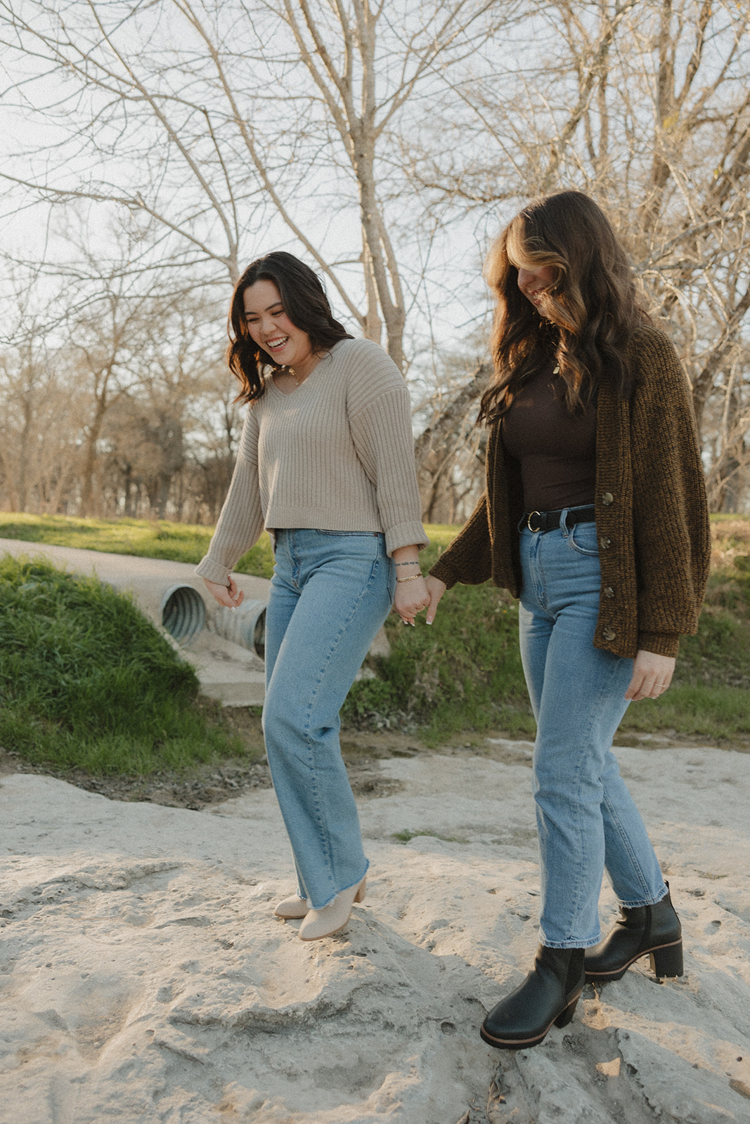 couple laughing and walking McKinney Falls State Park in Austin Texas