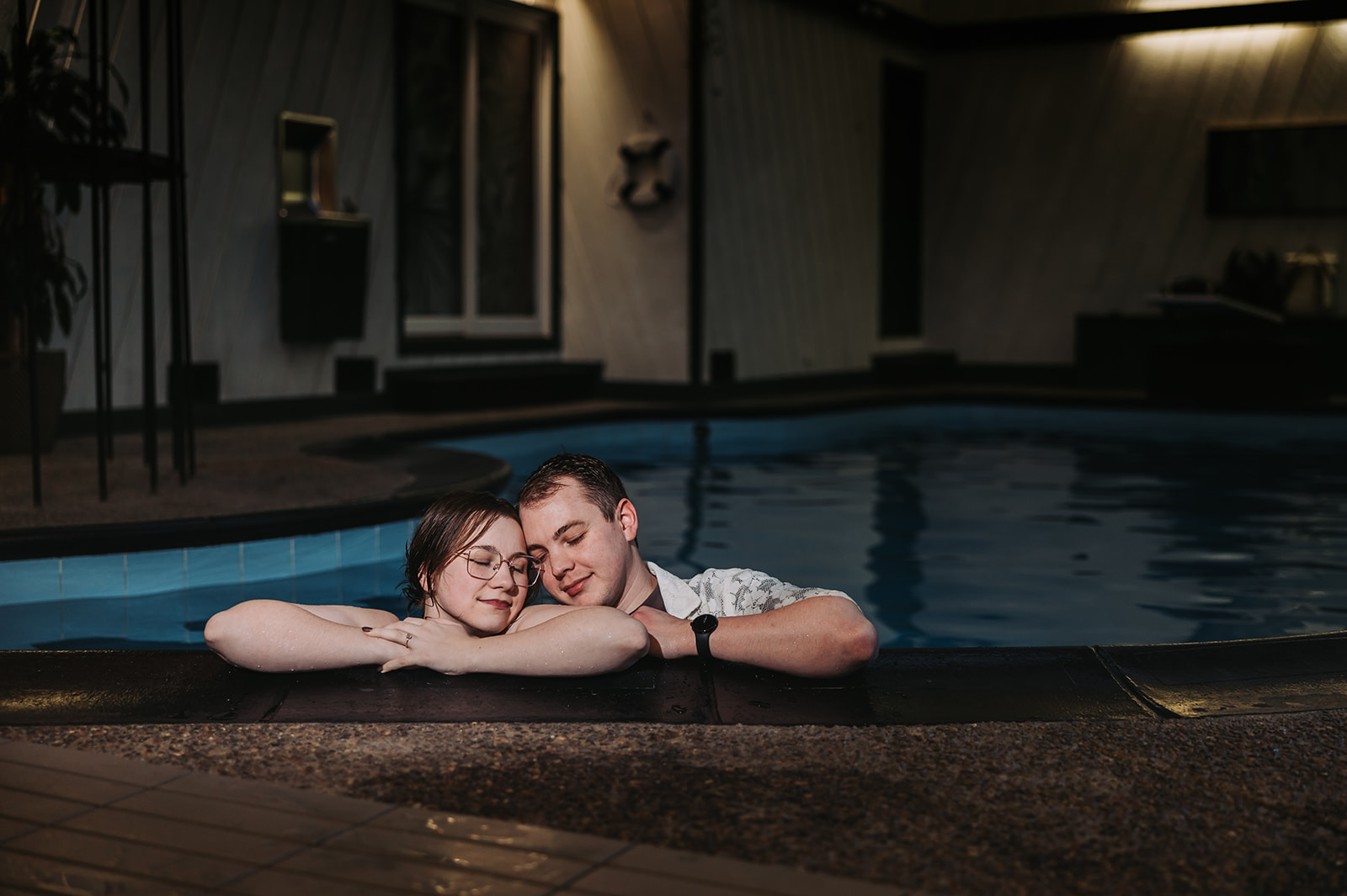  classic nighttime couples photos at a pool in minneapolis