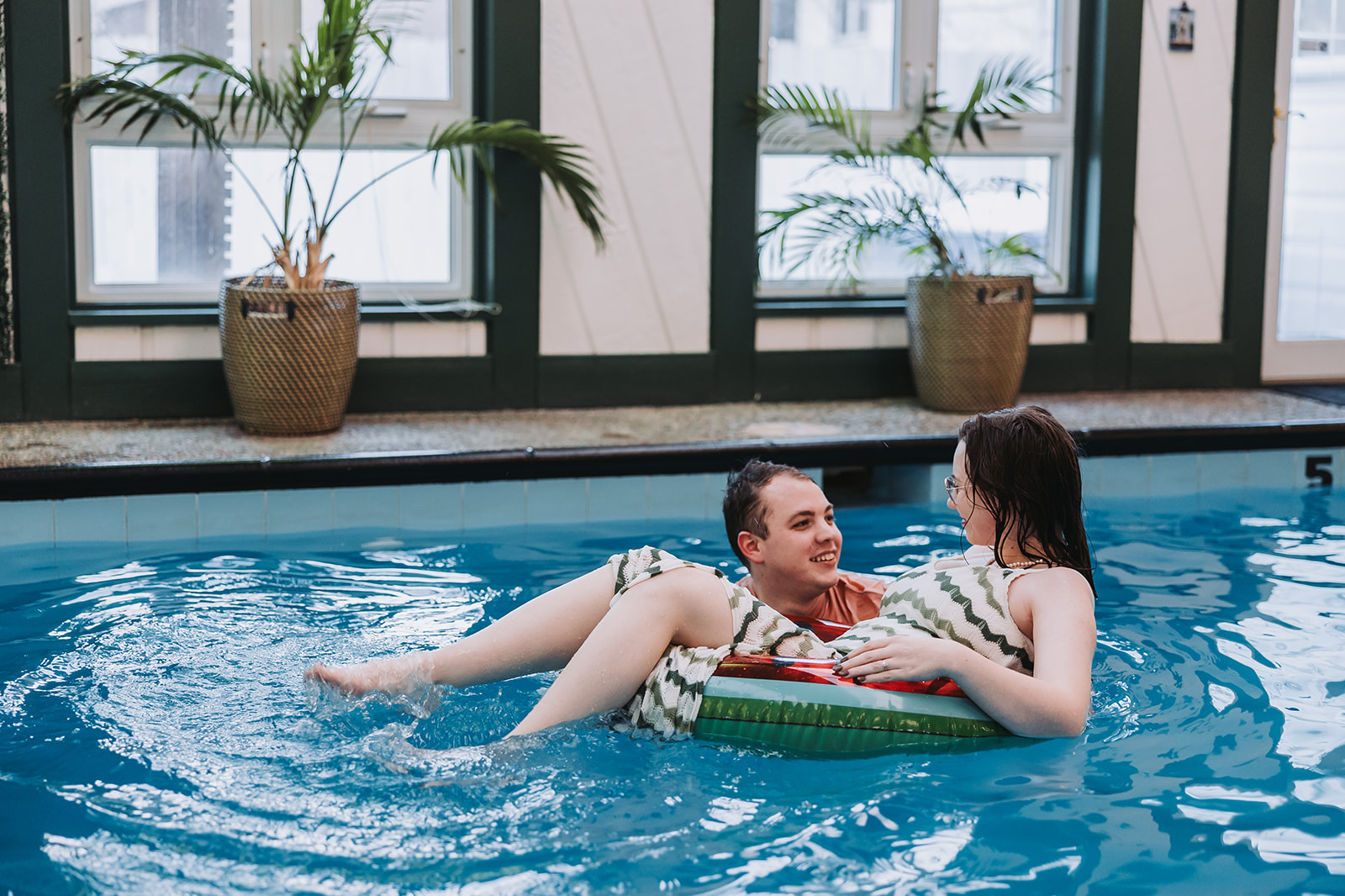 couple swimming at a pool in minneapolis