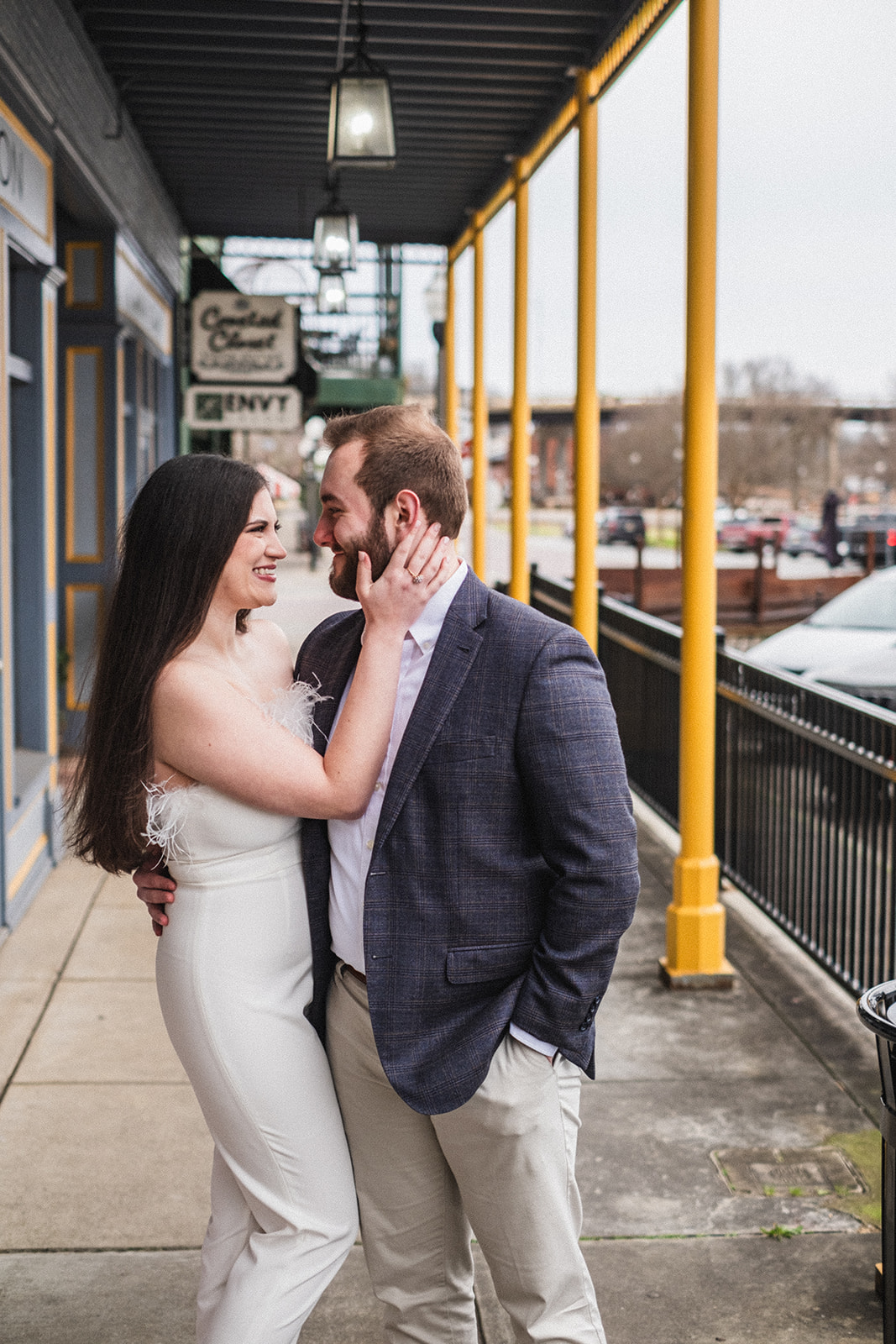 couple lovingly looking into each others eyes during the engagement session in opelika alabama