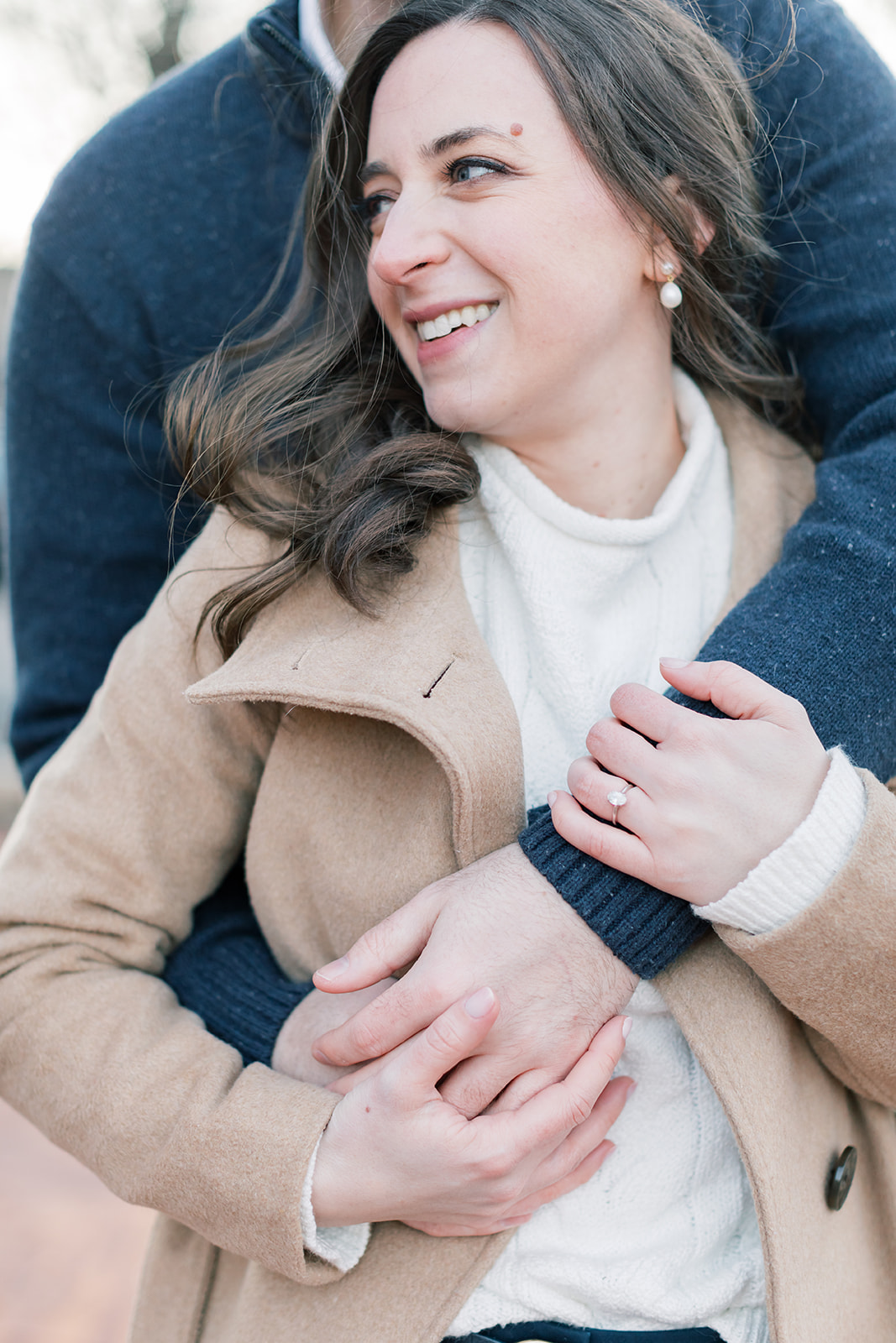 An engaged couple in Washington DC during their winter engagement session