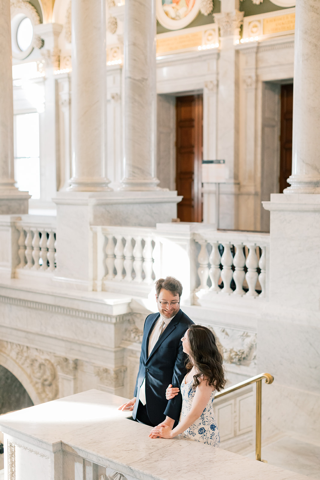 An engaged couple in the Library of Congress during their winter engagement session in Washington DC