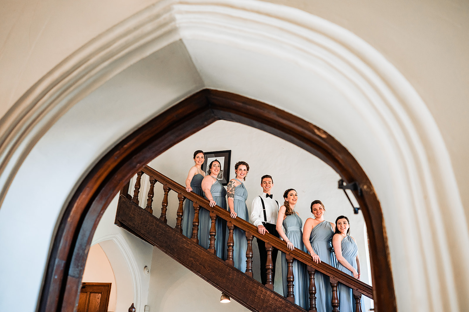 bridal party photo on stairs at aldie mansion