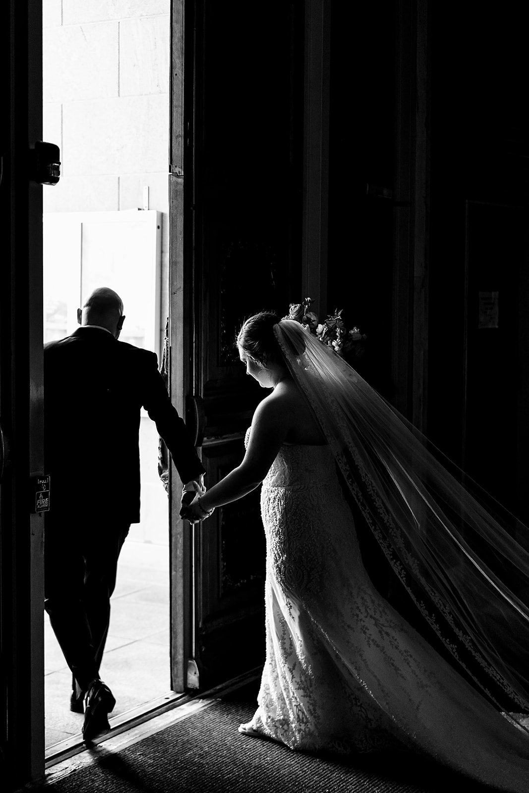 bride and groom exiting national shrine of our lady of czestochowa church after being married