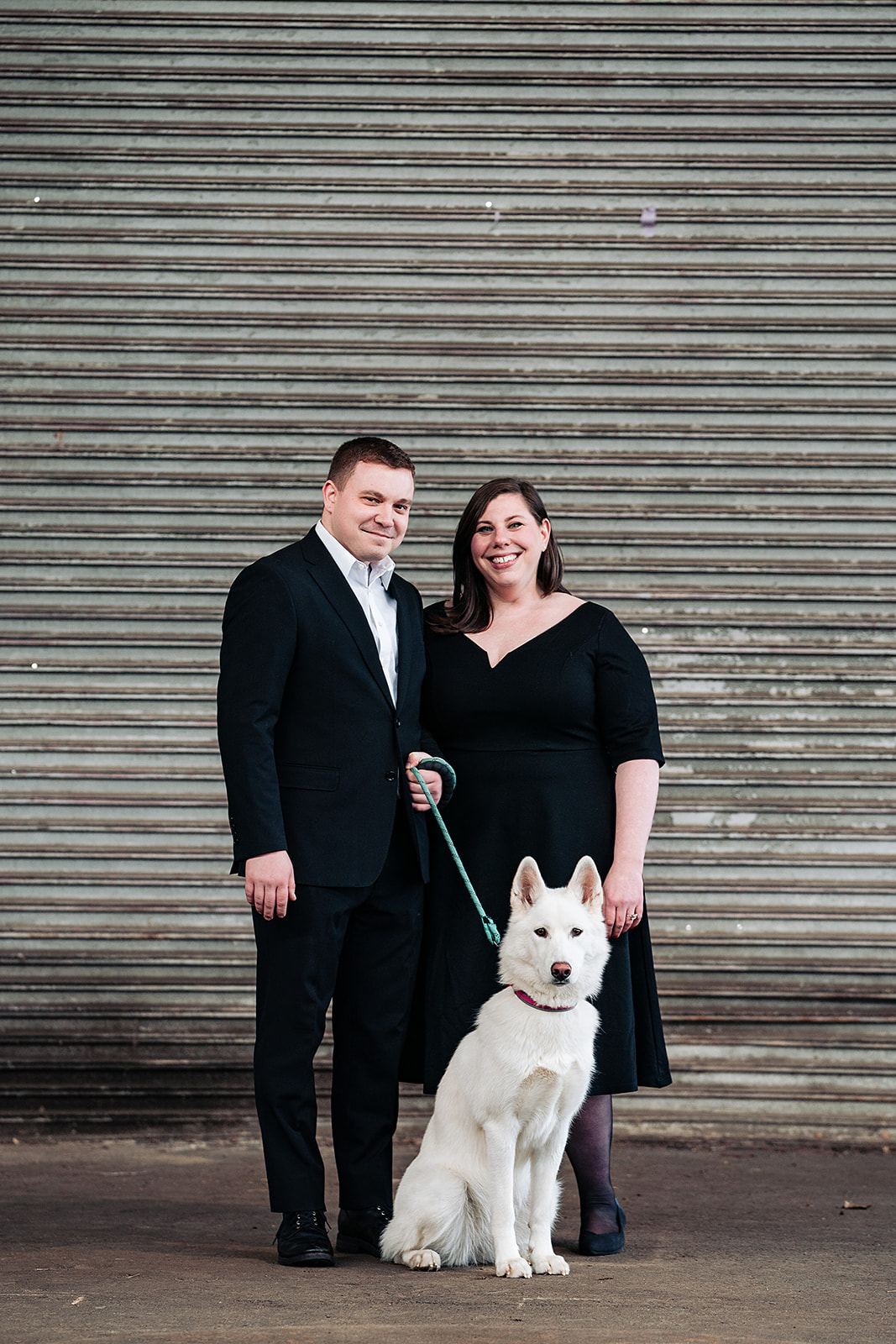family portrait with dog at cherry street pier