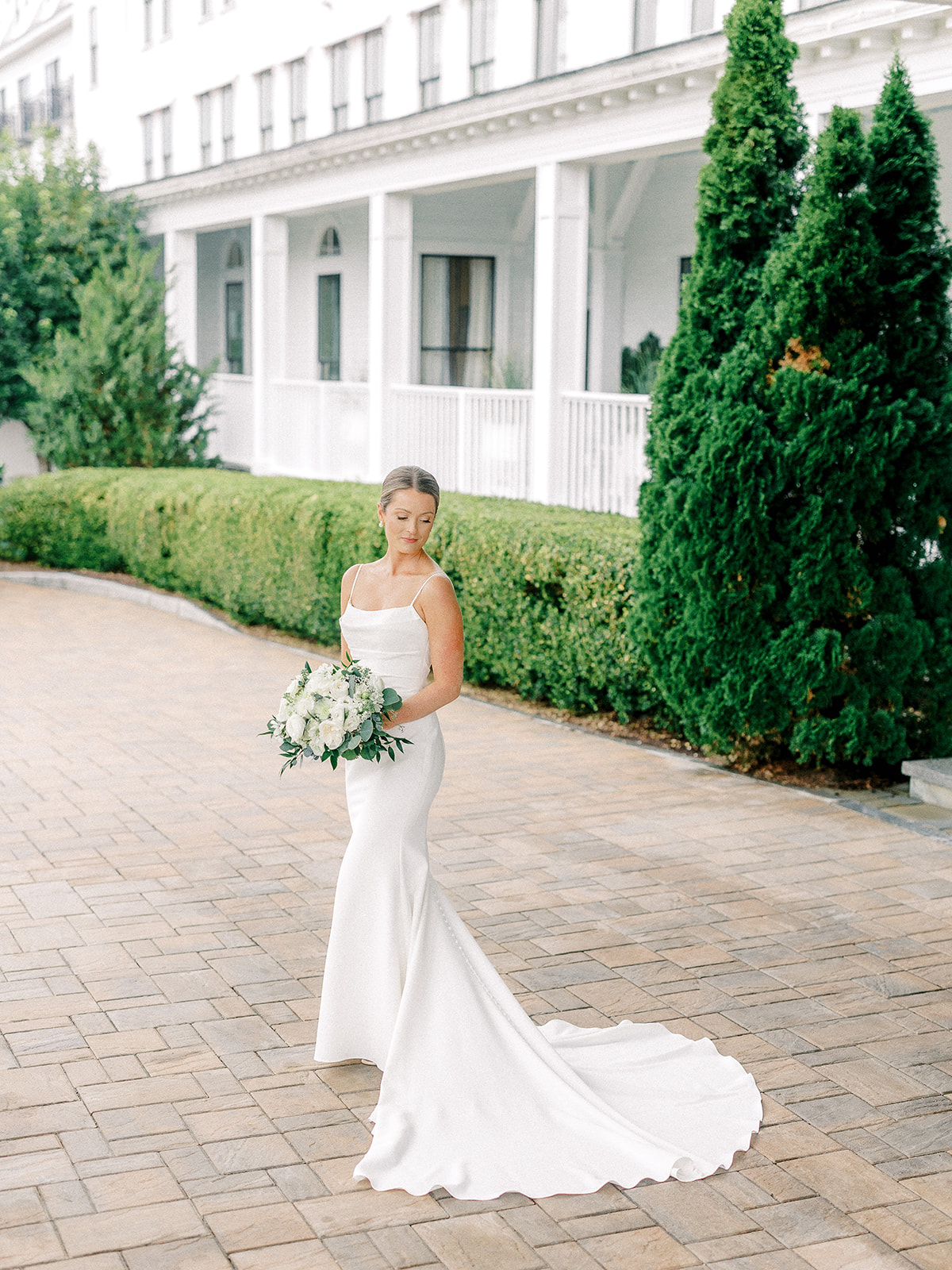 Bride at Wentworth By The hotel before her Wentworth By The Sea Country Club wedding.
