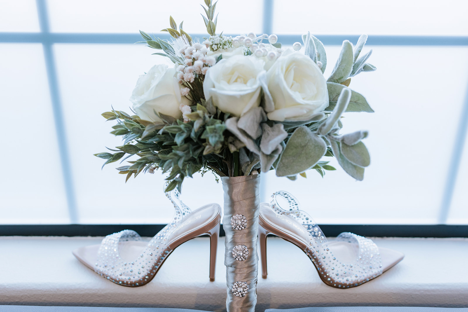 Brides Shoes and flowers, White Flowers for the Bouquet 
