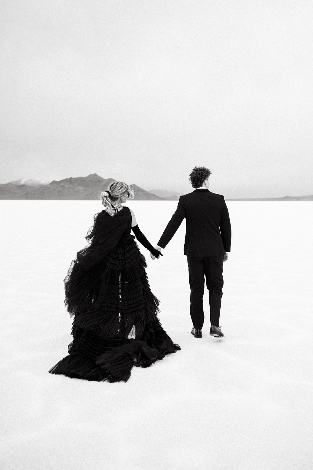 Elegant bridal shoot at Utah Salt Flats with sweeping tulle dress