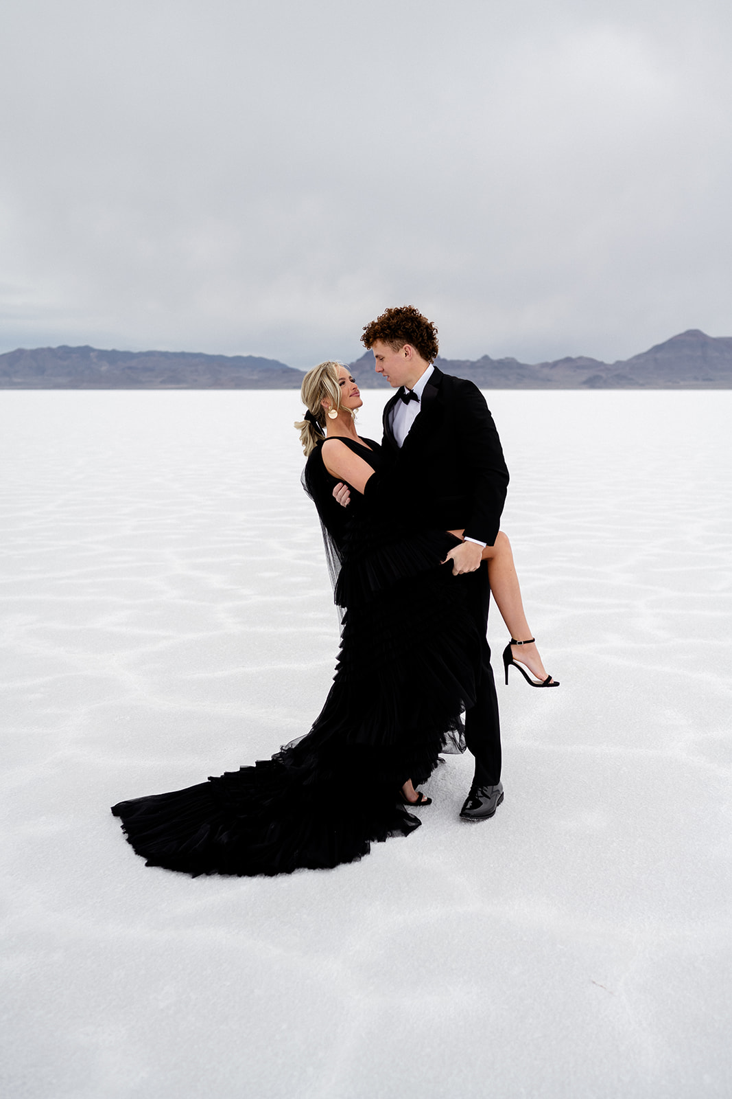 Wind-blown elopement with Utah’s Salt Flats as the romantic backdrop