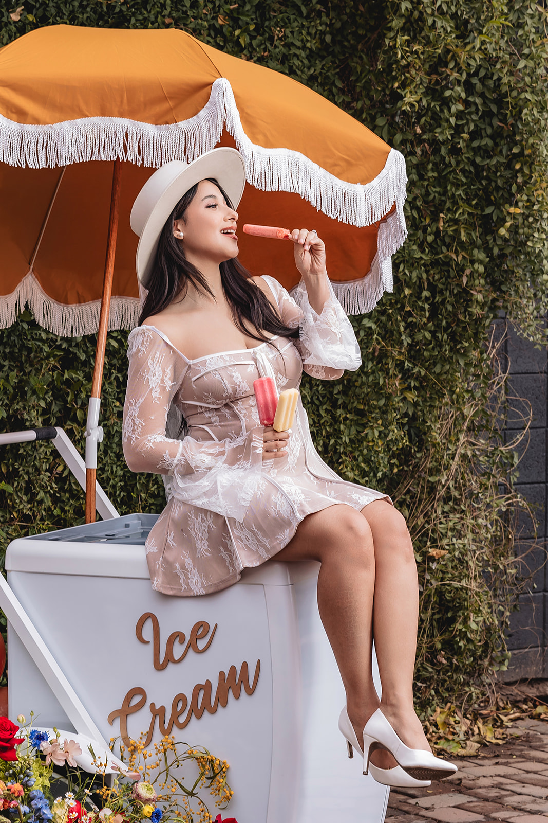 bride sitting on the Ice cream cart