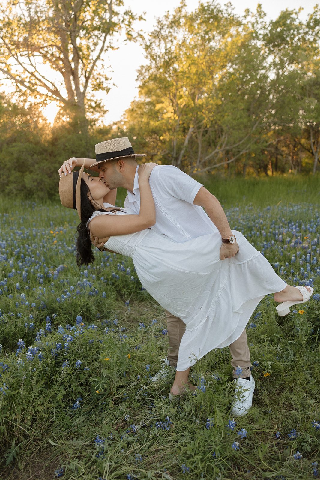 Couple dancing in a field of Bluebonnets at McKinney Falls state park